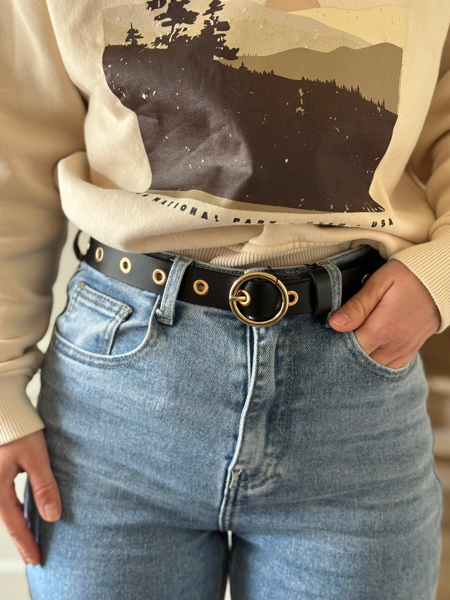 Leren riem met goudkleurige ringen - Zwart